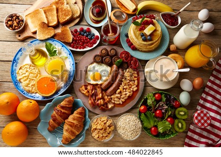 stock-photo-breakfast-buffet-full-continental-and-english-coffee-orange-juice-salad-croissant-fruit-484022845.jpg